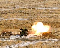 A Stryker MGS from 1-38 Inf. engages a target during gunnery at the Yakima Training Center. Photo by Jason Kaye, Northwest Guardian