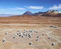 Swarms of Pluto-Size Objects Kick Up Dust around Adolescent Sun-Like Star