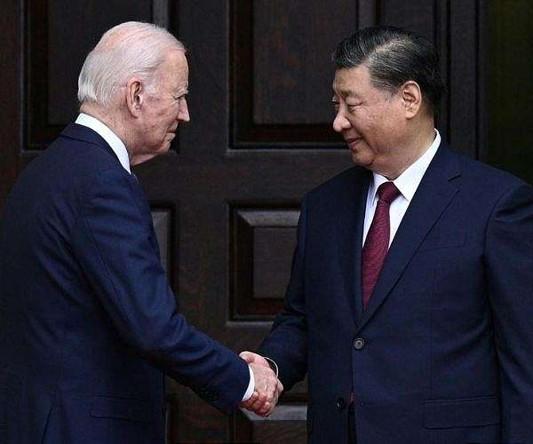 Biden, Xi pledge to reduce tensions at summit