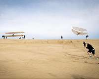 The biplanes constructed by Lilienthal and the Wright brothers fly together for the first time
