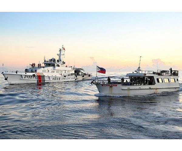 Chinese ships fire water cannons, collide with Philippine vessels in disputed waters