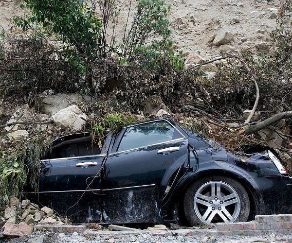 Two dead, 16 missing in north China mudslide: state media