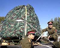 Shenzhou-5 Re-Entry Capsule Passes To Research Institute