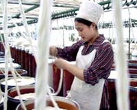 China warns companies evading new labour law