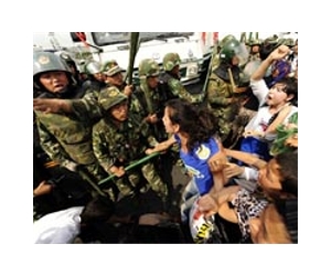 China paper says leaders must listen after riots
