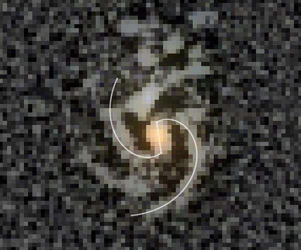 Barred spiral galaxy spotted 11.5 billion years in the past