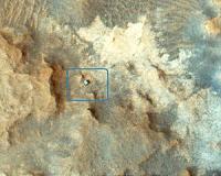 Mars Orbiter Spies Curiosity Rover at Work