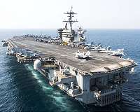 New COVID-19 cases on US carrier despite extensive screening