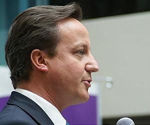 British PM says no authority to topple Kadhafi