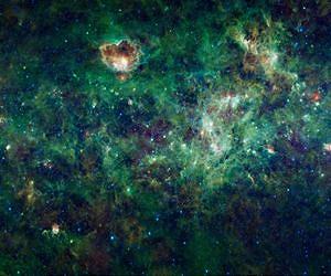 Distant galaxy cluster found in plain view