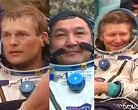 Record-breaking astronauts return to Earth