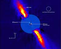 Infant exoplanet weighed by Hipparcos and Gaia