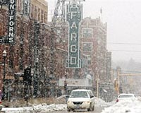Blizzard bears down on flooded North Dakota