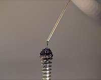 Spiky ferrofluid thrusters can move satellites