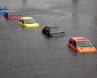 Cheaper to invest in climate change fight than to rebuild; EPA chief rolls back US plans