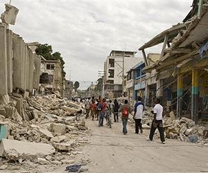 Haitians pray in ruins as quake toll soars