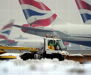 Snow and fog ground half of London Heathrow's flights