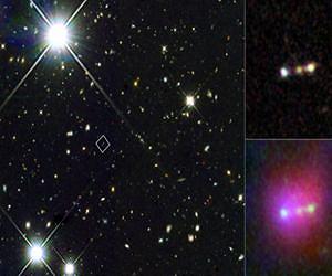 Infant Galaxies Merging Near 'Cosmic Dawn'