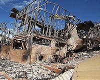 Australia fires ease as damage mounts after record heat