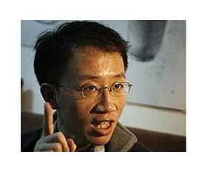 China dissident Hu Jia kept at home on rights day