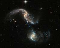 Hubble offers new image of dramatic galactic collision