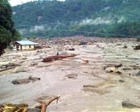 At least 11 dead as floods and landslide hit Indonesia