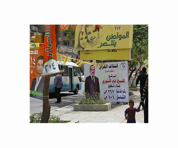 Iraqi voters turn out in numbers as region watches on