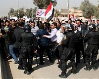 Iraq security forces arrest armed men after protester killed