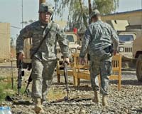 Petraeus may urge troop cutbacks in September
