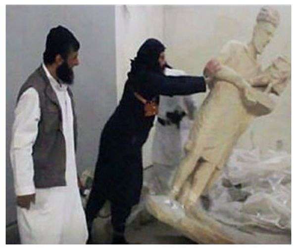 Iraqi museum damaged by IS works toward reopening