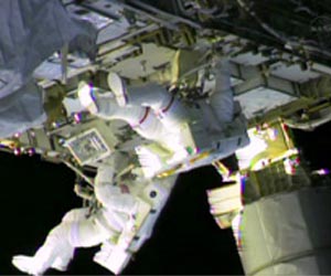 NASA astronauts on spacewalk to fix ammonia leak