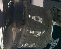 Astronauts enter inflatable room at space station