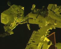 Spacewalking French, US astronauts begin upgrade to orbiting lab