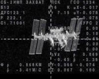 Three-man crew reaches International Space Station