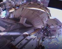 Space blanket floats away during historic spacewalk