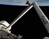 Canada Delays Decision On Sale Of Space Firm