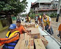 Indonesian Rescuers Battle To Reach Flood Victims