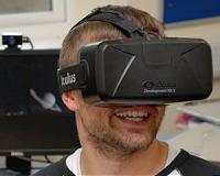 Oculus looks to spur VR spread with Rift price cut