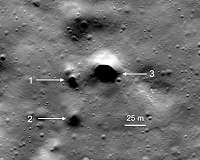 Possible Lava Tube Skylights Discovered Near the North Pole of the Moon