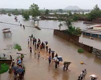 Two dead, thousands flee as floods hit Malaysia's Penang