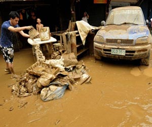 One dead, thousands affected in Philippine floods: police