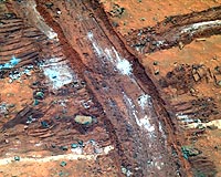 Spirit Examines Churned-Up Martian Soil
