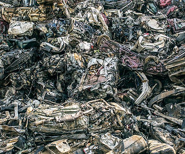 Metal scrap upcycled into high-value alloys with solid phase manufacturing