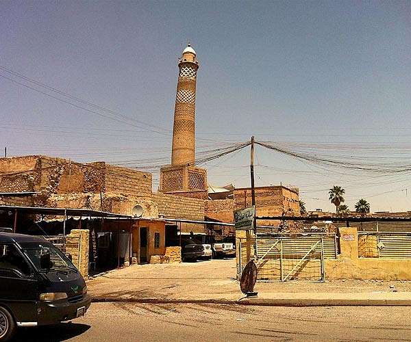 Iraq's famed 'hunchback' of Mosul rebuilt brick by brick