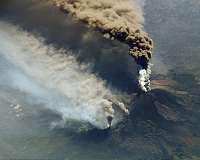 Italy's Mount Etna spews clouds of ash