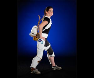 Powered exoskeleton helps paralyzed walk
