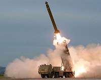 North Korea says tested 'super-large' rocket launchers