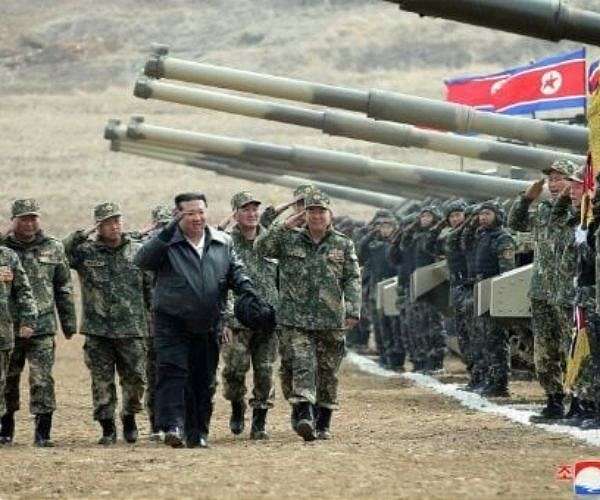 N. Korean leader unveils and 'drives' new battle tank