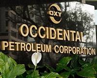 Oxy takes a rare loss