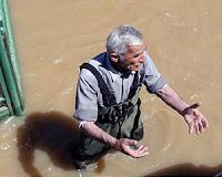 Seine tops its banks as heavy rain batters France